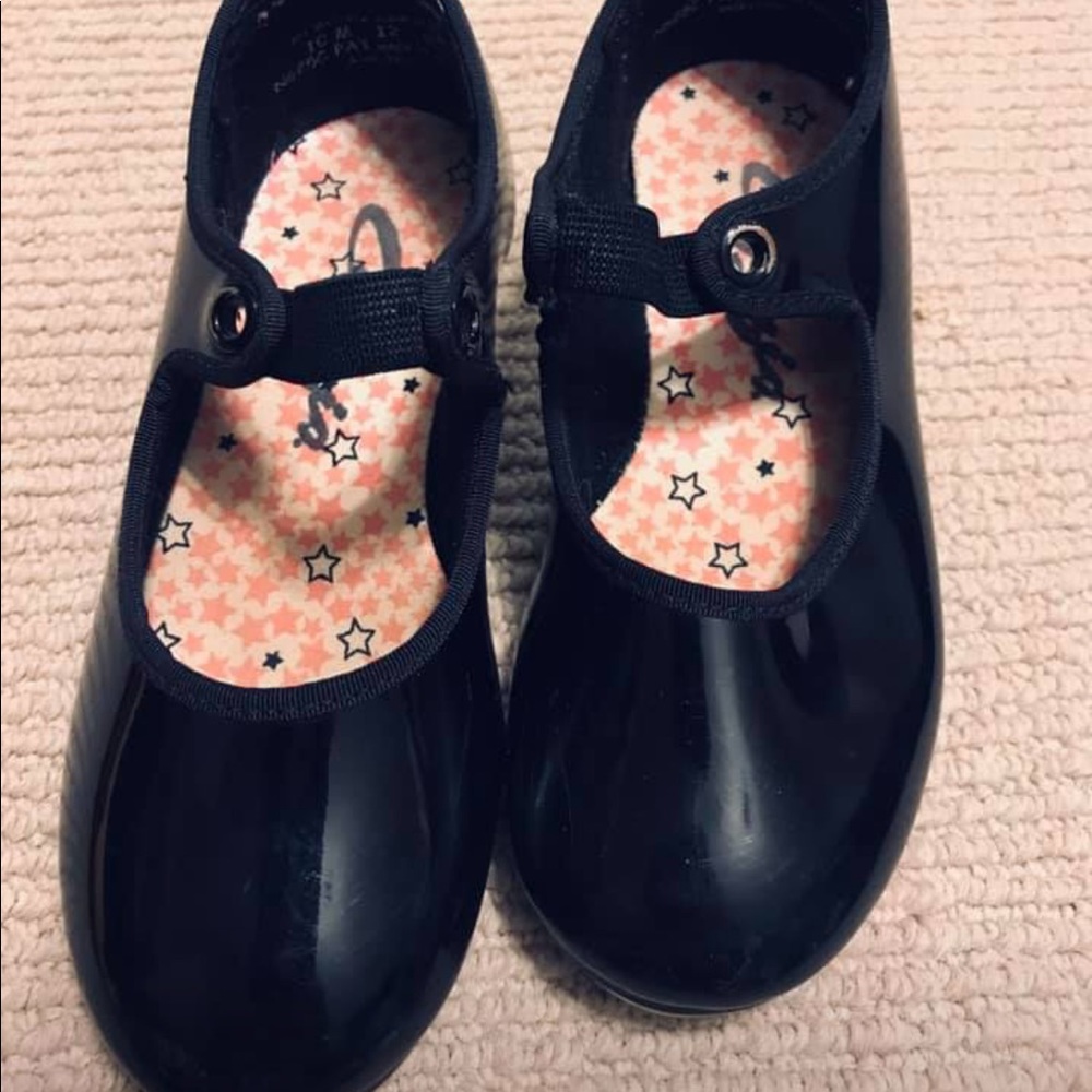 Capezio child’s black tap shoes